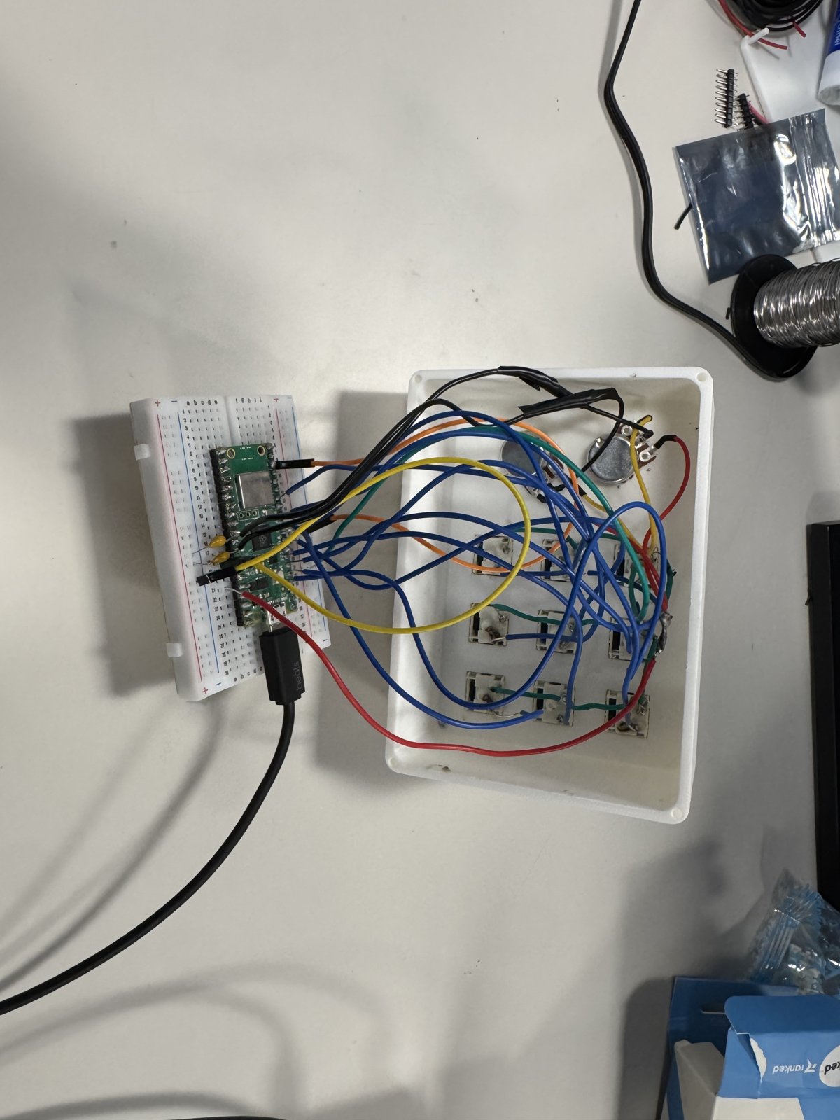 3x3 MIDI grid wiring connected to breadboard and Raspberry Pi Pico